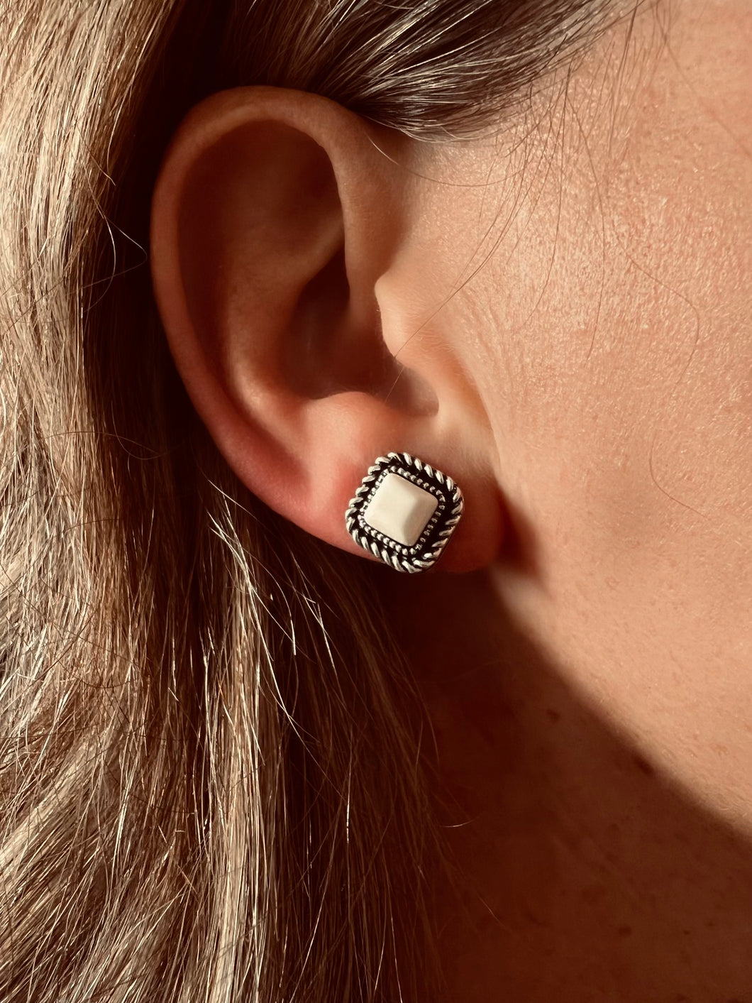 Colt White Stud Earrings